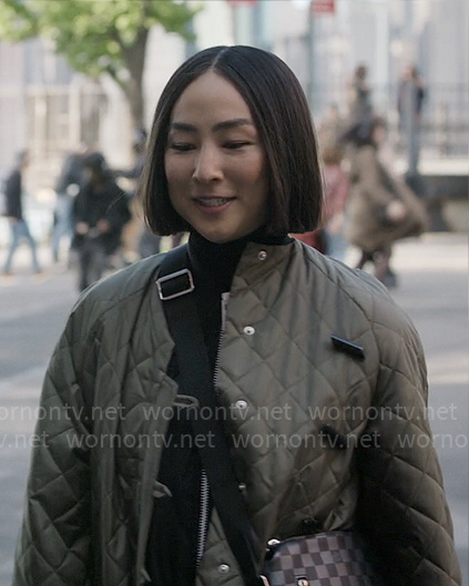 Stella’s long green quilted coat on The Morning Show
