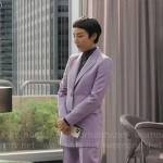 Stella’s purple suit and printed turtleneck top on The Morning Show
