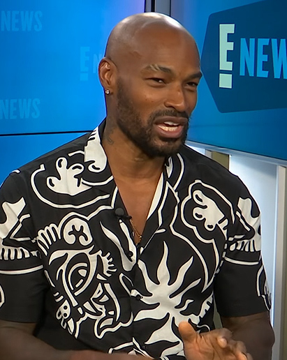 Tyson Beckford’s black printed shirt on E! News