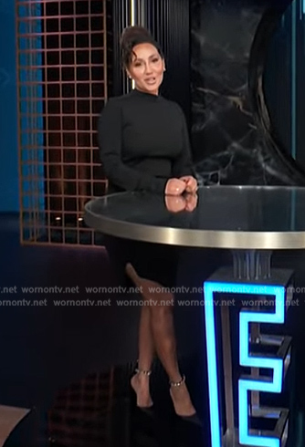 Adrienne’s black platform boots E! News