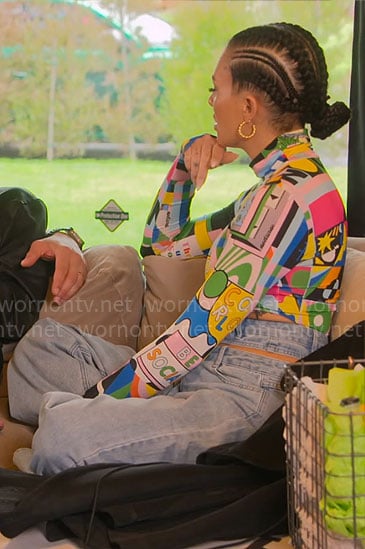 Amanza’s colorful printed top and cutout jeans on Selling Sunset
