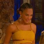 Amanza’s yellow textured top and skirt with cutouts in Cabo on Selling Sunset