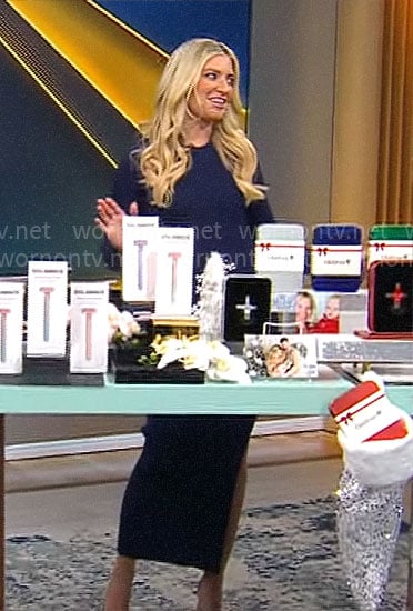 Ashley Bellman’s navy midi sweater dress on CBS Mornings