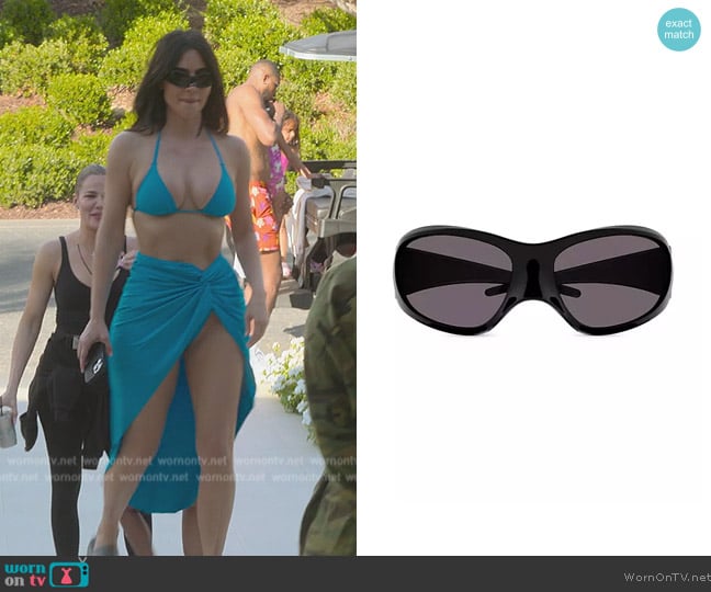 Balenciaga Skin 80MM Oval Shield Sunglasses worn by Kim Kardashian (Kim Kardashian) on The Kardashians