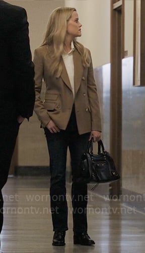 Bradley’s taupe brown blazer and black bag on The Morning Show