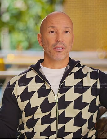 Brett’s navy and white print zip jacket on Selling Sunset