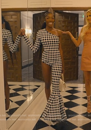 Chelsea’s check one sleeve jumpsuit on Selling Sunset