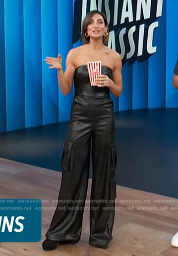 Courtney Mazza’s black leather jumpsuit on Access Hollywood