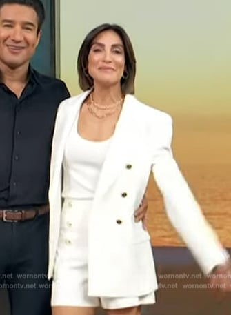 Courtney Lopez’s white double breasted blazer on Access Hollywood