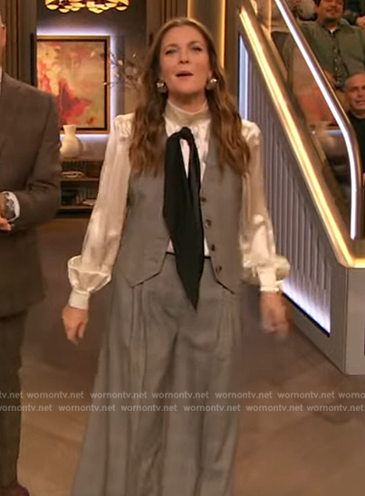 Drew’s white tie neck blouse and vest on The Drew Barrymore Show