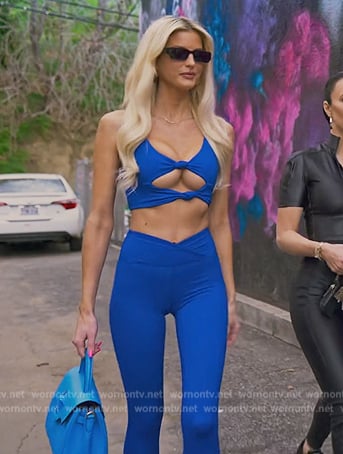 Emma’s blue twist front sports bra and leggings on Selling Sunset
