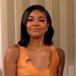 Gabrielle Union’s orange leather dress on The Drew Barrymore Show