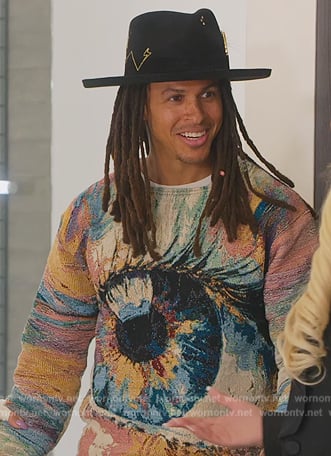 Garran’s multicolored eye graphic sweater on Selling Sunset