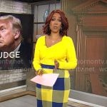 Gayle King’s yellow asymmetric sweater and blue checked skirt on CBS Mornings