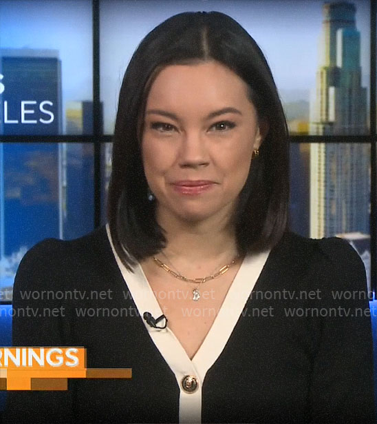 Jo Ling Kent’s black cardigan with white trim on CBS Mornings