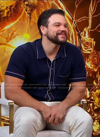 Josh Andrés Rivera’s navy contrast trim shirt on Good Morning America
