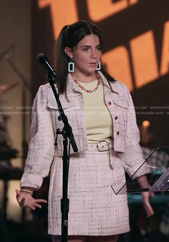 Julia Roome’s white tweed jacket and mini skirt on The Voice