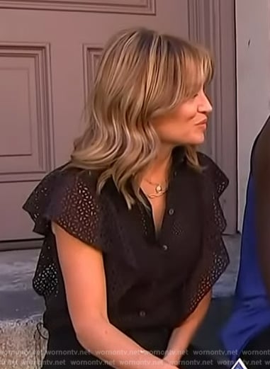 Kit’s black ruffle sleeve top on Access Hollywood