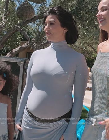 Kourtney’s blue mesh top and skirt on The Kardashians