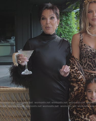 Kris’s black feather trim satin dress on The Kardashians