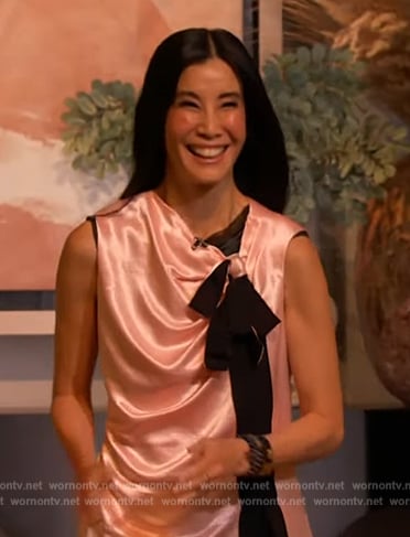 Lisa Ling’s pink satin contrast tie top on The Drew Barrymore Show