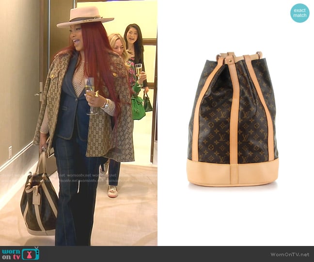 Louis Vuitton Monogram Randonnee GM Backpack worn by Garcelle Beauvais on The Real Housewives of Beverly Hills