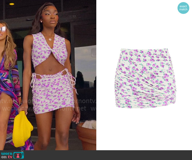 Magda Butrym Floral printed draped swim mini skirt worn by Chelsea Lazkani on Selling Sunset