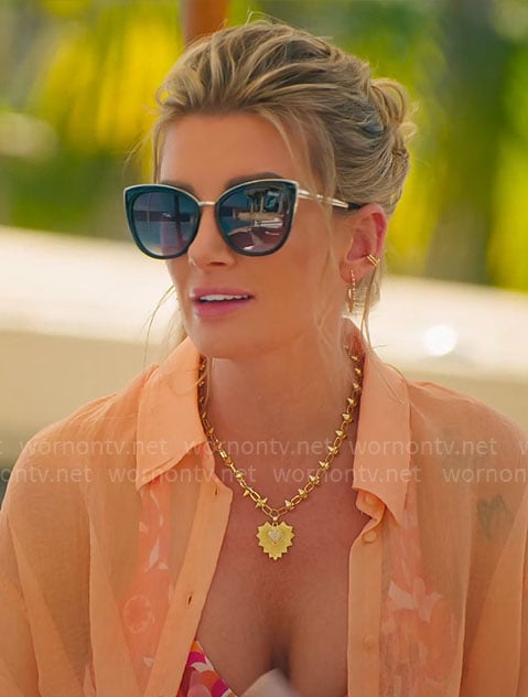 Nicole’s printed bikini and cat eye sunglasses on Selling Sunset