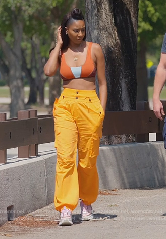 Guerdy’s orange utility pants on The Real Housewives of Miami