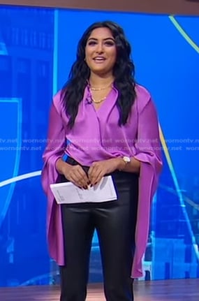 Reena’s purple satin draped wrap blouse on Good Morning America