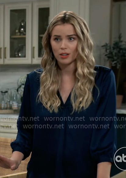 Sasha’s blue v-neck satin blouse on General Hospital