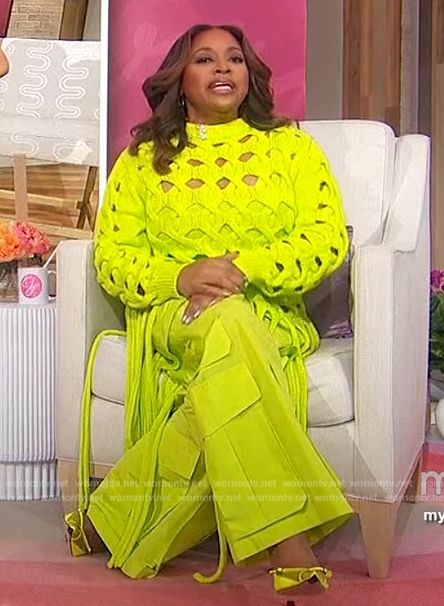 Sherri’s neon open knit sweater and utility pants on Sherri