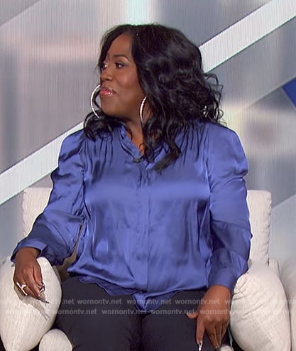 Sheryl blue satin blouse on The Talk