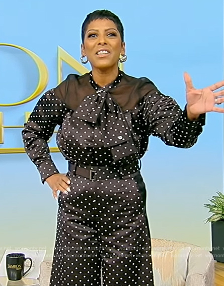 Tamron’s black polka dot blouse and pants on Tamron Hall Show
