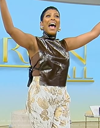 Tamron’s brown metallic leather vest on Tamron Hall Show