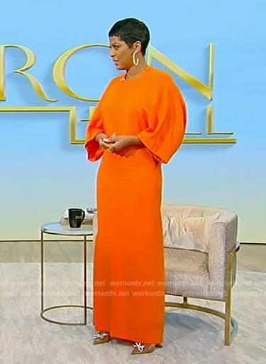 Tamron’s orange maxi dress on Tamron Hall Show