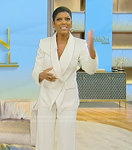 Tamron’s white metallic trim blazer on Tamron Hall Show