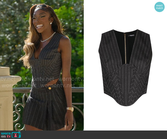 Versace Pinstripe corseted wool top worn by Chelsea Lazkani on Selling Sunset