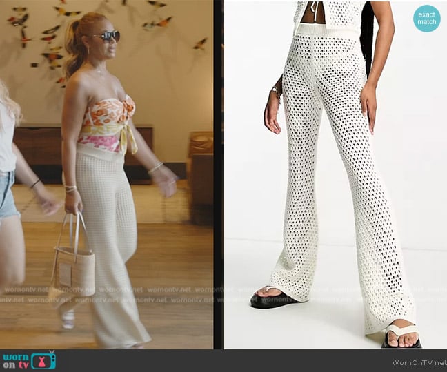 ASOS Crochet flare pants in white worn by Gizelle Bryant on The Real Housewives of Potomac