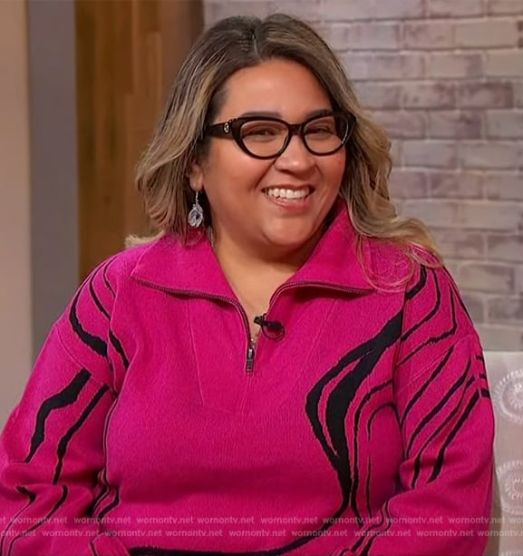 Zuli Garcia’s pink printed half zip sweater on Sherri