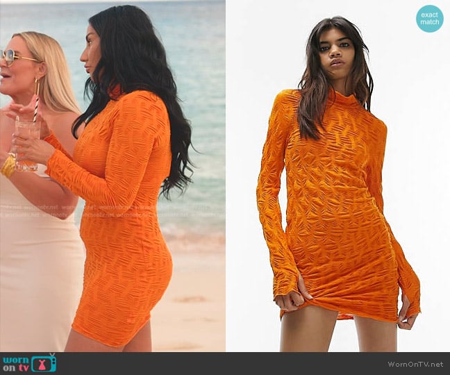 Topshop Textured Jersey Long Sleeve Mini Dress in orange worn by Monica Garcia on The Real Housewives of Salt Lake City