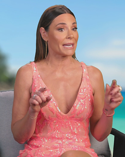 Luann’s coral metallic confessional dress on The Real Housewives Ultimate Girls Trip