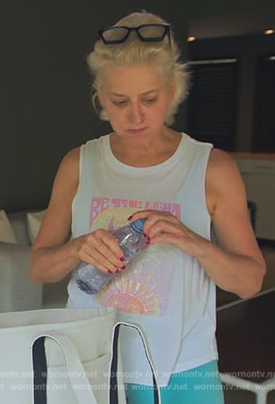 Dorinda’s white be the light graphic tank on The Real Housewives Ultimate Girls Trip