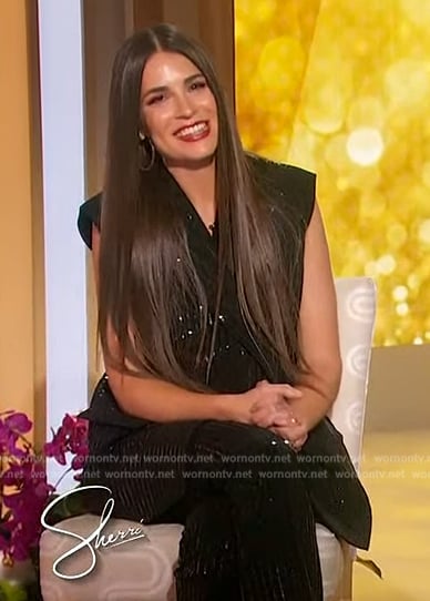 Erica Wark’s black sequin jacket and pants on Sherri