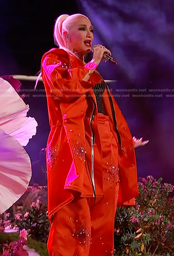 Gwen Stefani’s black embellished tank and red jacket on The Voice