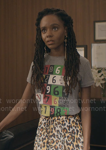 Hazel’s Black History Month t-shirt and leopard skirt on The Other Black Girl