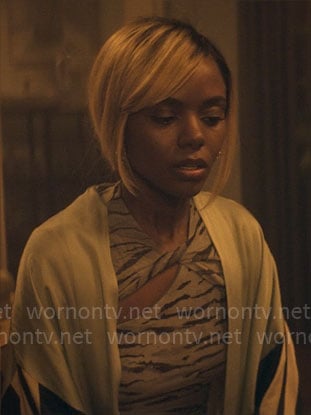 Hazel’s zebra print twist cutout top on The Other Black Girl