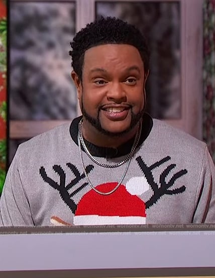 Jawn’s grey reindeer Christmas sweater on Sherri
