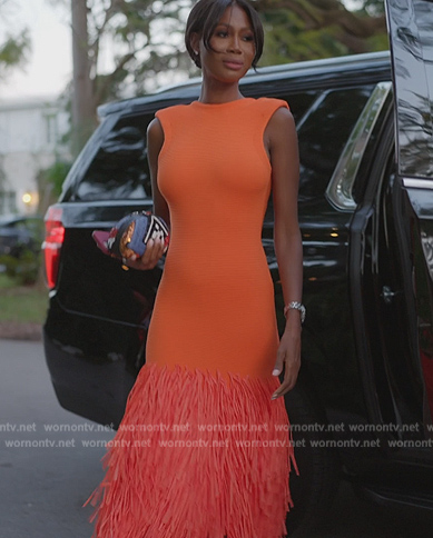 Kiki’s orange feather trim dress on The Real Housewives of Miami