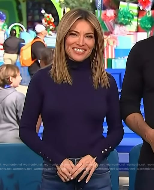 Kit’s navy high neck sweater on Access Hollywood